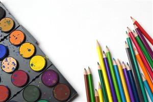 Colorful palette of watercolors and colored pencils. Colorful palette of watercolors and colored pencils.